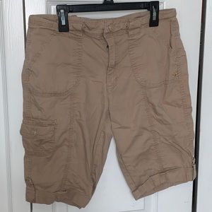 Big girls tan mid length shorts.